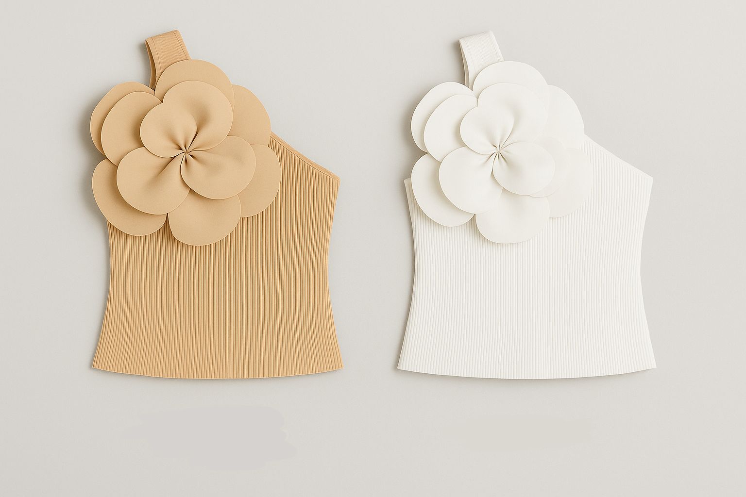 Top de punto con flores 3D y corte oversize